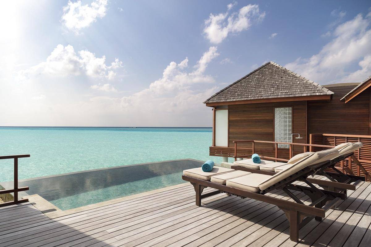 Sunset Over Water Pool Villa
