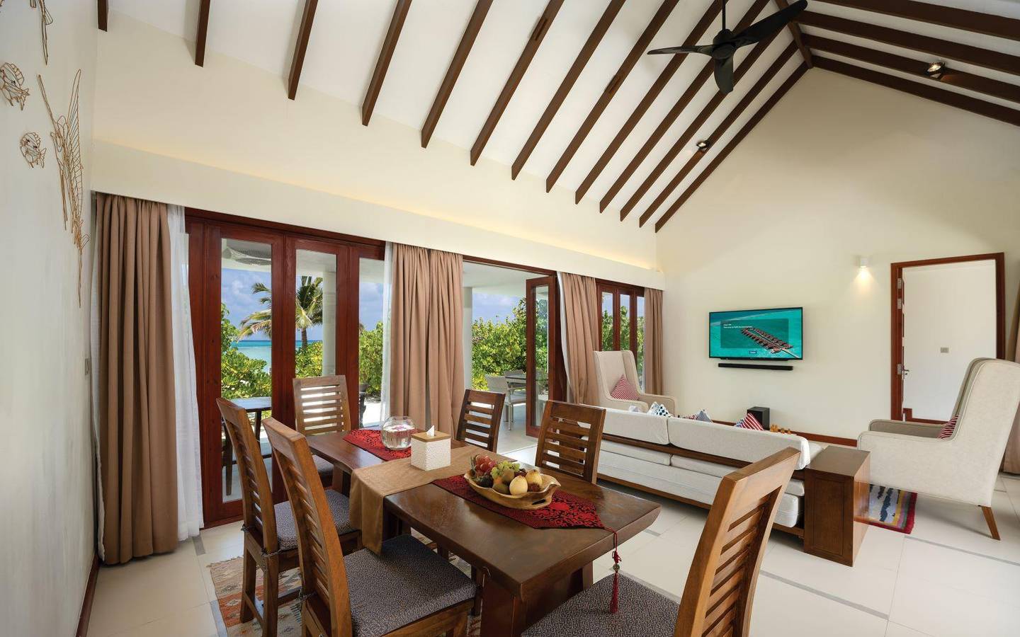 varu-by-atmosphere-maldives-the-majlis-suite-living-dining-room-2