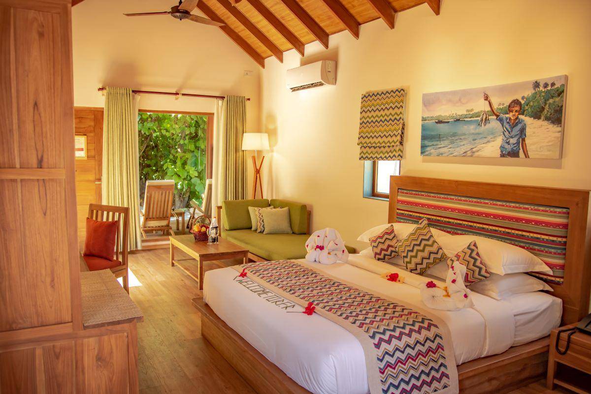 Reethi Faru Resort, Malediven, Garden Villa, Schlafzimmer