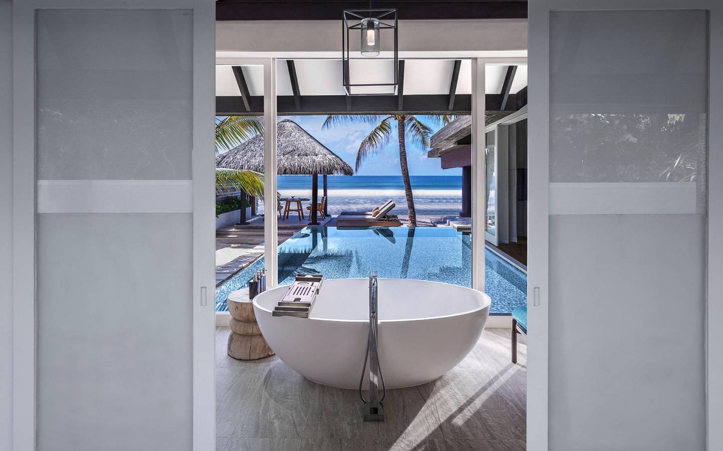 Naladhu_Private_Island_Maldives_Guest_Room_Ocean_House_with_Pool_Bathroom_with_Pool_View