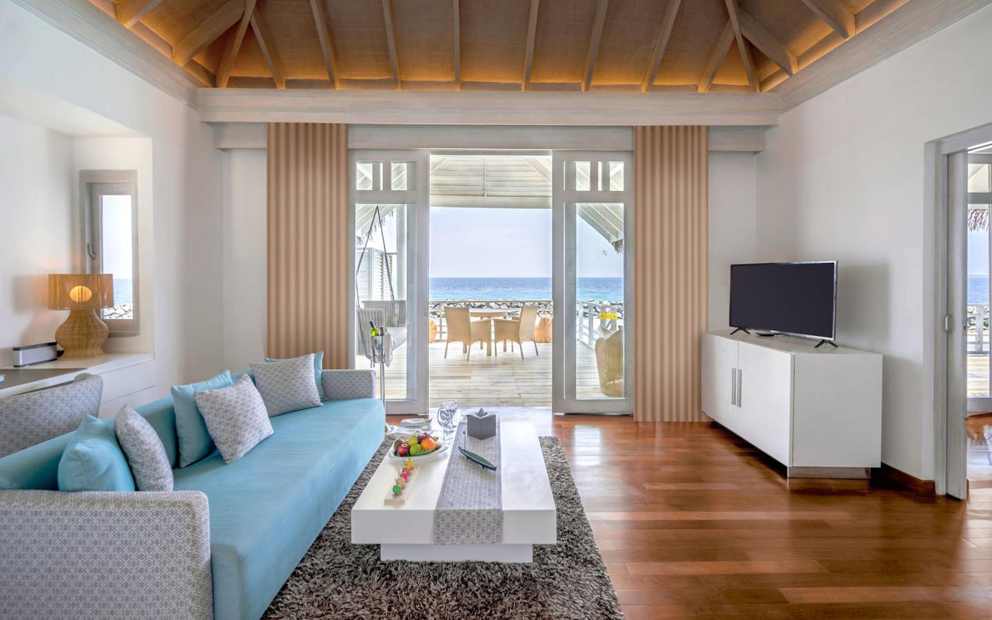 NH_Maldives_Kuda_Rah_Resort_Over_Water_Suite_with_Private_Pool_Living_Area