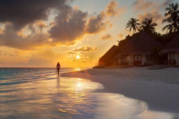 Coco Palm Dhuni Kolhu, Malediven, Strand bei Sonnenuntergang