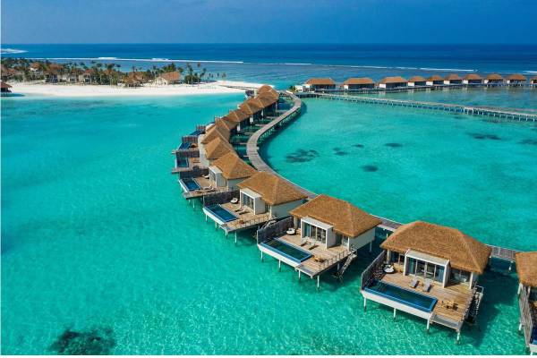 Überwasservilla Sonnenuntergang Radisson Hotel Maldives 1