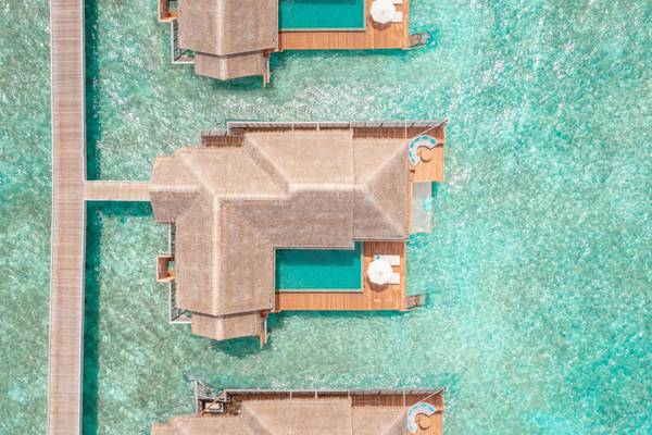 Anantara Kihavah - Aerial Over Water Pool Villas Portrait
