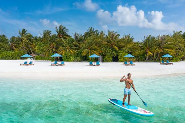 Naladhu_Private_Island_Maldives_Beach_Stand_Up_Paddleboarding